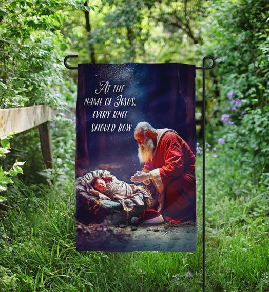 KNEELING SANTA AT THE MANGER  GARDEN FLAG