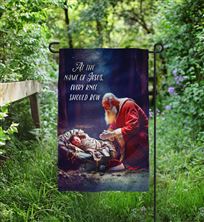 KNEELING SANTA AT THE MANGER  GARDEN FLAG