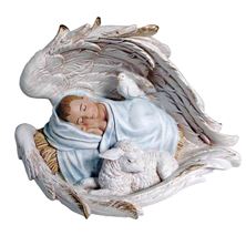 BABY JESUS IN BLUE SWADDLING RESTING WITH A LAMB IN ANGEL WINGS