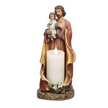 ST. JOSEPH STATUE WITH VOTIVE