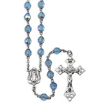 MULTIFACETED LIGHT SAPPHIRE CRYSTAL BEAD ROSARY WITH MIRACULOUS MEDAL CENTER